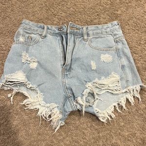 Light washed jean shorts, they are from shein, and they are a size 2!